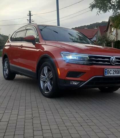 Помаранчевий Фольксваген Тігуан, об'ємом двигуна 1.98 л та пробігом 100 тис. км за 24500 $, фото 1 на Automoto.ua