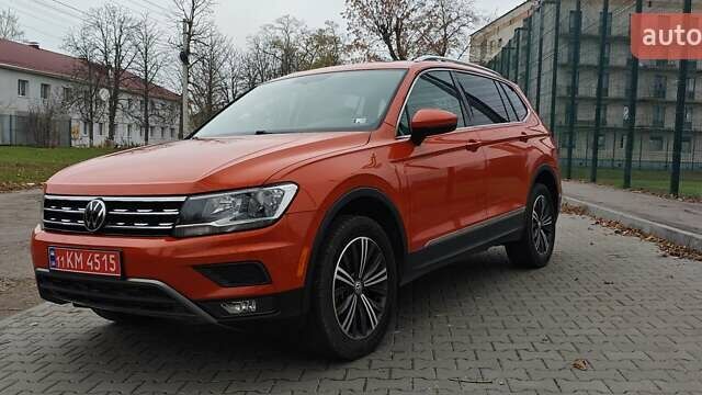 Оранжевый Фольксваген Тигуан, объемом двигателя 1.98 л и пробегом 148 тыс. км за 16200 $, фото 1 на Automoto.ua