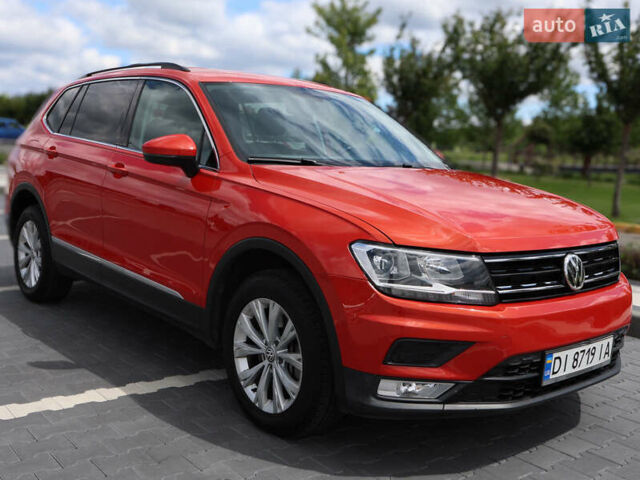 Помаранчевий Фольксваген Тігуан, об'ємом двигуна 2 л та пробігом 146 тис. км за 21000 $, фото 1 на Automoto.ua