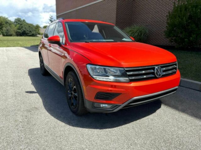 Помаранчевий Фольксваген Тігуан, об'ємом двигуна 2 л та пробігом 31 тис. км за 9000 $, фото 1 на Automoto.ua