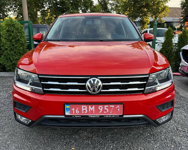 Помаранчевий Фольксваген Тігуан, об'ємом двигуна 1.98 л та пробігом 115 тис. км за 18800 $, фото 1 на Automoto.ua