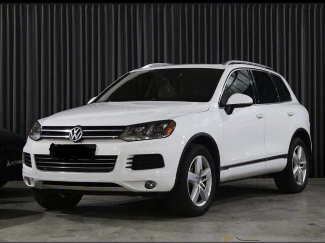 Белый Фольксваген Туарег, объемом двигателя 3 л и пробегом 286 тыс. км за 16900 $, фото 1 на Automoto.ua