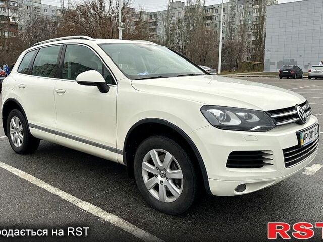 Белый Фольксваген Туарег, объемом двигателя 3 л и пробегом 254 тыс. км за 19500 $, фото 1 на Automoto.ua