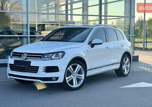 Белый Фольксваген Туарег, объемом двигателя 4.13 л и пробегом 128 тыс. км за 29000 $, фото 1 на Automoto.ua