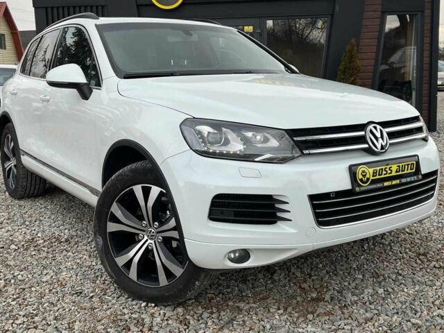 Белый Фольксваген Туарег, объемом двигателя 3 л и пробегом 214 тыс. км за 18999 $, фото 1 на Automoto.ua