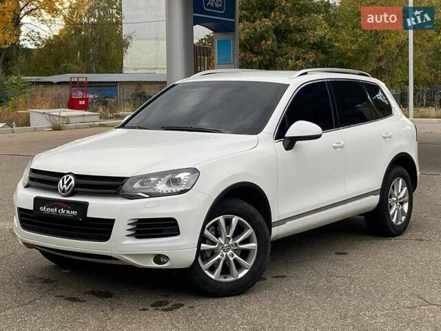 Белый Фольксваген Туарег, объемом двигателя 2.98 л и пробегом 258 тыс. км за 22499 $, фото 1 на Automoto.ua