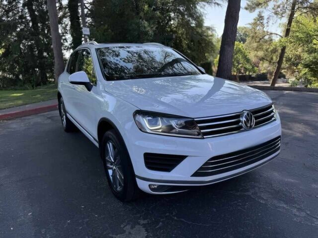 Белый Фольксваген Туарег, объемом двигателя 3.6 л и пробегом 77 тыс. км за 13700 $, фото 1 на Automoto.ua