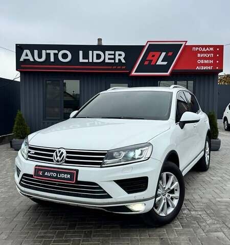 Білий Фольксваген Туарег, об'ємом двигуна 2.97 л та пробігом 320 тис. км за 23200 $, фото 1 на Automoto.ua