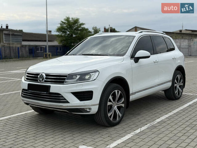 Білий Фольксваген Туарег, об'ємом двигуна 3 л та пробігом 135 тис. км за 32900 $, фото 1 на Automoto.ua