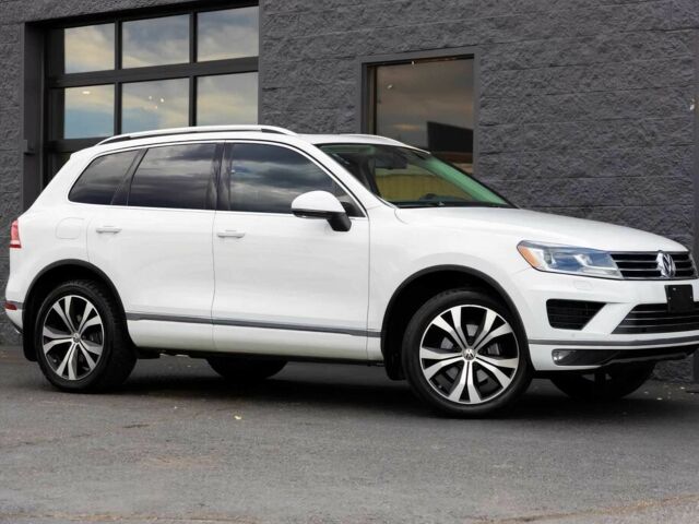 Білий Фольксваген Туарег, об'ємом двигуна 3 л та пробігом 76 тис. км за 12300 $, фото 1 на Automoto.ua