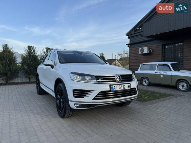 Білий Фольксваген Туарег, об'ємом двигуна 3 л та пробігом 229 тис. км за 32600 $, фото 1 на Automoto.ua