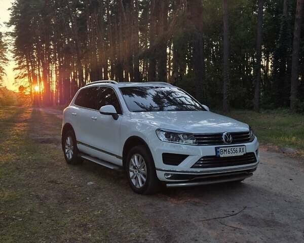 Білий Фольксваген Туарег, об'ємом двигуна 2.97 л та пробігом 139 тис. км за 37300 $, фото 1 на Automoto.ua