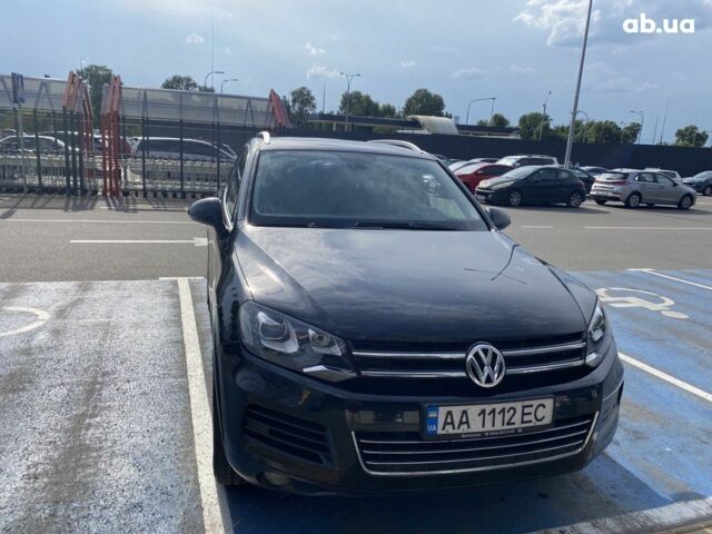 Черный Фольксваген Туарег, объемом двигателя 3 л и пробегом 290 тыс. км за 20500 $, фото 1 на Automoto.ua