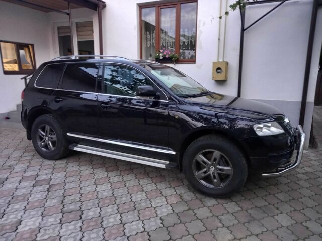 Черный Фольксваген Туарег, объемом двигателя 3.2 л и пробегом 204 тыс. км за 8100 $, фото 1 на Automoto.ua