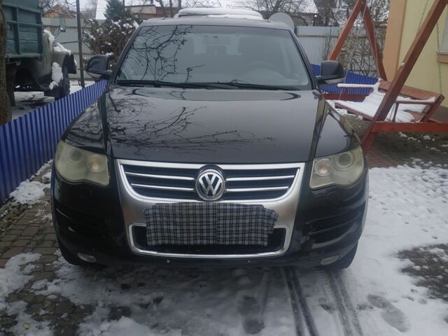 Черный Фольксваген Туарег, объемом двигателя 3 л и пробегом 262 тыс. км за 11200 $, фото 1 на Automoto.ua
