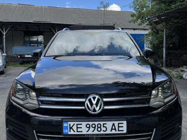 Черный Фольксваген Туарег, объемом двигателя 3 л и пробегом 324 тыс. км за 20500 $, фото 1 на Automoto.ua