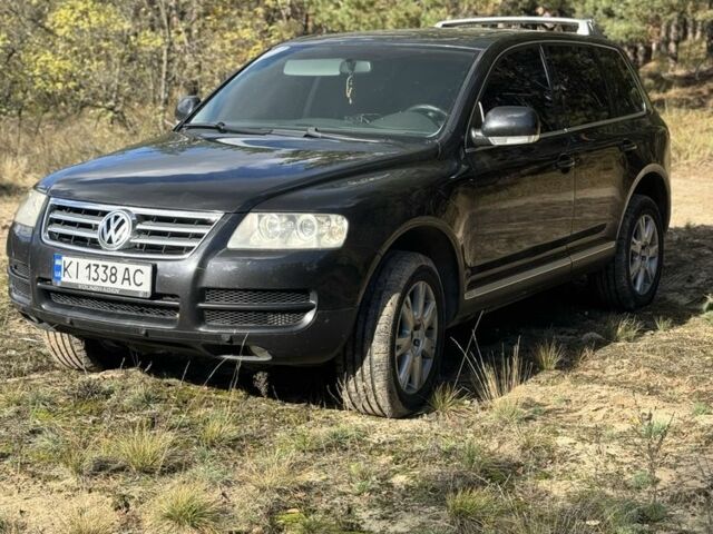 Черный Фольксваген Туарег, объемом двигателя 2.5 л и пробегом 350 тыс. км за 8800 $, фото 1 на Automoto.ua