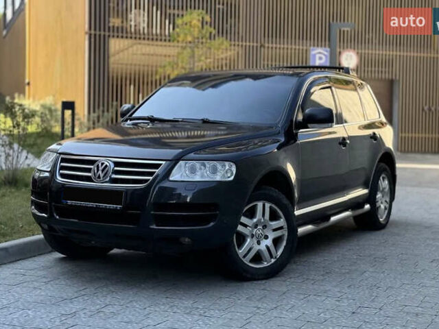 Чорний Фольксваген Туарег, об'ємом двигуна 3.2 л та пробігом 300 тис. км за 7600 $, фото 1 на Automoto.ua