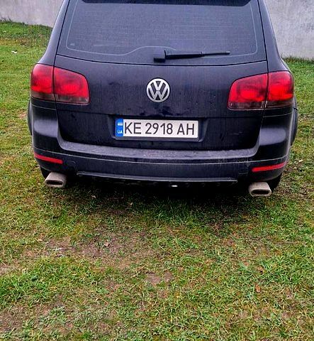 Черный Фольксваген Туарег, объемом двигателя 3.2 л и пробегом 204 тыс. км за 7400 $, фото 1 на Automoto.ua