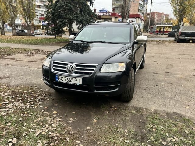 Черный Фольксваген Туарег, объемом двигателя 3.2 л и пробегом 340 тыс. км за 7000 $, фото 1 на Automoto.ua
