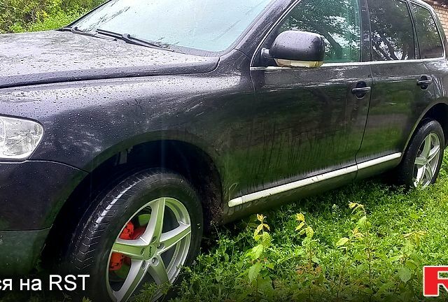 Черный Фольксваген Туарег, объемом двигателя 2.5 л и пробегом 310 тыс. км за 7500 $, фото 1 на Automoto.ua