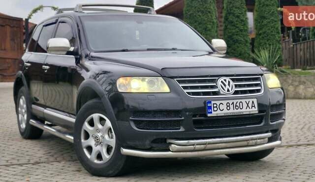 Черный Фольксваген Туарег, объемом двигателя 3.2 л и пробегом 237 тыс. км за 7500 $, фото 1 на Automoto.ua