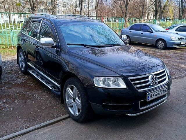 Черный Фольксваген Туарег, объемом двигателя 4.2 л и пробегом 0 тыс. км за 8000 $, фото 1 на Automoto.ua