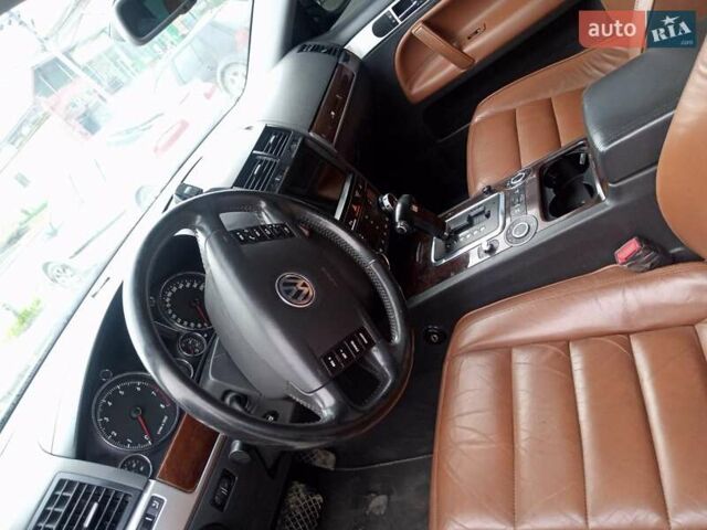 Черный Фольксваген Туарег, объемом двигателя 3.19 л и пробегом 236 тыс. км за 10000 $, фото 1 на Automoto.ua