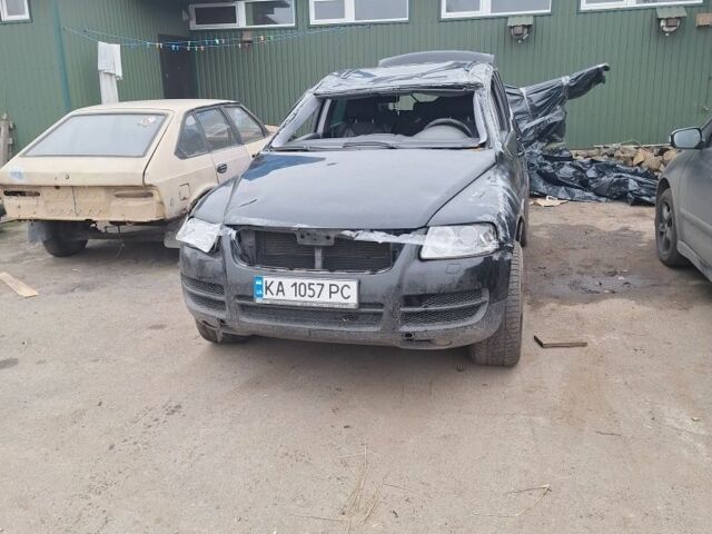 Черный Фольксваген Туарег, объемом двигателя 2.5 л и пробегом 250 тыс. км за 2000 $, фото 1 на Automoto.ua