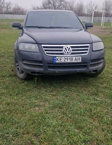 Черный Фольксваген Туарег, объемом двигателя 3.2 л и пробегом 204 тыс. км за 7400 $, фото 1 на Automoto.ua