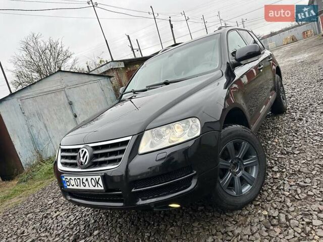 Черный Фольксваген Туарег, объемом двигателя 2.46 л и пробегом 225 тыс. км за 6450 $, фото 1 на Automoto.ua