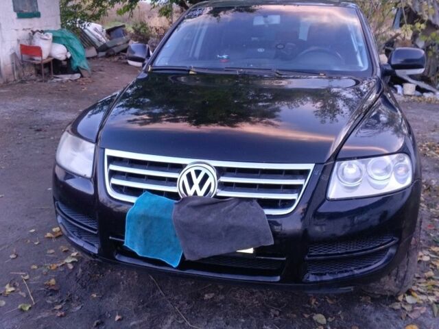 Чорний Фольксваген Туарег, об'ємом двигуна 2 л та пробігом 380 тис. км за 5460 $, фото 1 на Automoto.ua