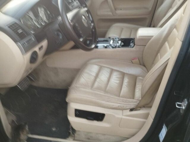 Черный Фольксваген Туарег, объемом двигателя 5 л и пробегом 290 тыс. км за 5000 $, фото 1 на Automoto.ua