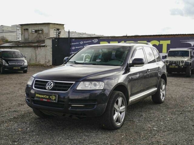 Черный Фольксваген Туарег, объемом двигателя 2.5 л и пробегом 395 тыс. км за 4100 $, фото 1 на Automoto.ua