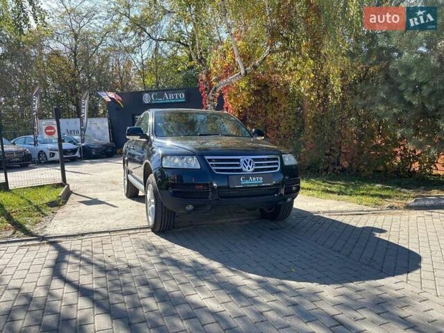 Черный Фольксваген Туарег, объемом двигателя 3.19 л и пробегом 381 тыс. км за 6700 $, фото 1 на Automoto.ua