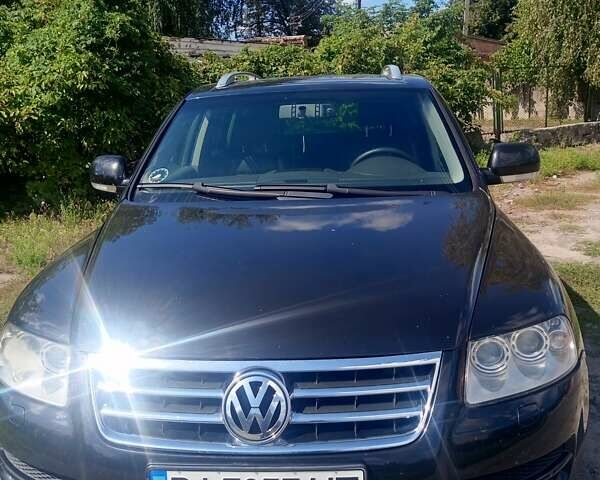 Черный Фольксваген Туарег, объемом двигателя 2.5 л и пробегом 317 тыс. км за 8500 $, фото 1 на Automoto.ua