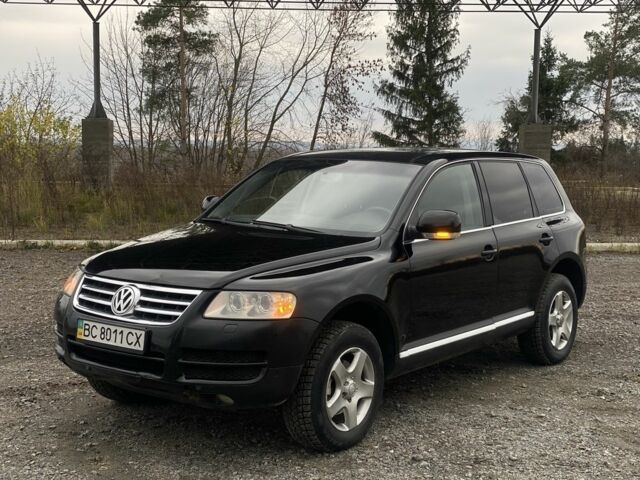 Чорний Фольксваген Туарег, об'ємом двигуна 2.5 л та пробігом 342 тис. км за 6100 $, фото 1 на Automoto.ua