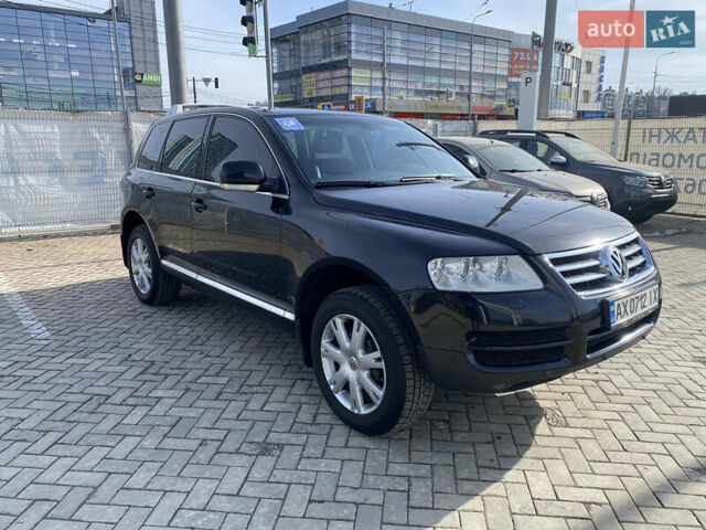 Чорний Фольксваген Туарег, об'ємом двигуна 3.2 л та пробігом 256 тис. км за 9200 $, фото 1 на Automoto.ua
