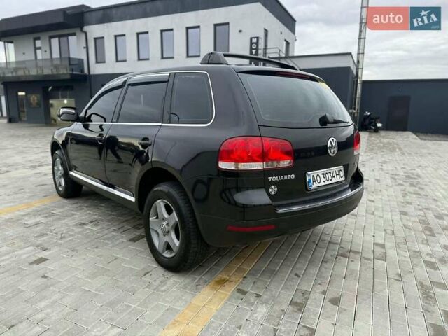 Чорний Фольксваген Туарег, об'ємом двигуна 2.5 л та пробігом 260 тис. км за 8000 $, фото 1 на Automoto.ua