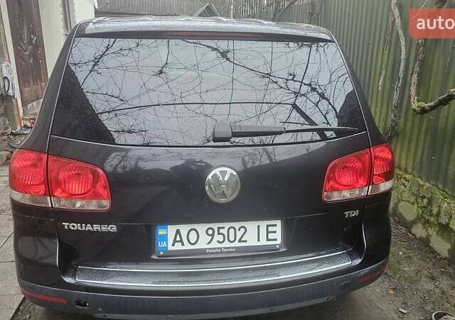 Чорний Фольксваген Туарег, об'ємом двигуна 2.46 л та пробігом 390 тис. км за 8500 $, фото 1 на Automoto.ua
