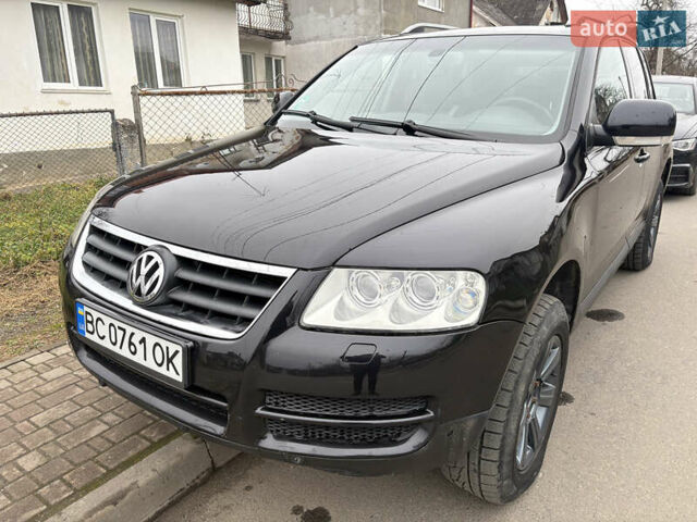 Черный Фольксваген Туарег, объемом двигателя 2.51 л и пробегом 321 тыс. км за 5999 $, фото 1 на Automoto.ua
