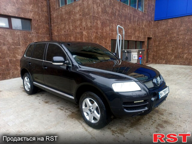 Черный Фольксваген Туарег, объемом двигателя 2.5 л и пробегом 270 тыс. км за 8000 $, фото 1 на Automoto.ua