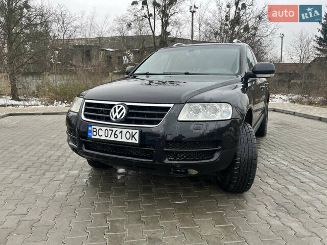 Черный Фольксваген Туарег, объемом двигателя 2.46 л и пробегом 221 тыс. км за 6700 $, фото 1 на Automoto.ua