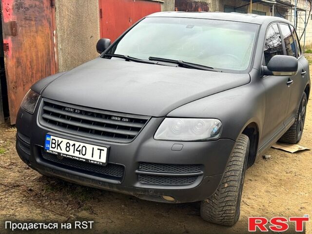 Чорний Фольксваген Туарег, об'ємом двигуна 4.9 л та пробігом 169 тис. км за 6000 $, фото 1 на Automoto.ua