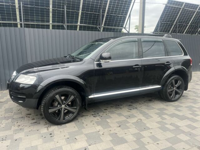 Черный Фольксваген Туарег, объемом двигателя 4.2 л и пробегом 250 тыс. км за 7777 $, фото 1 на Automoto.ua