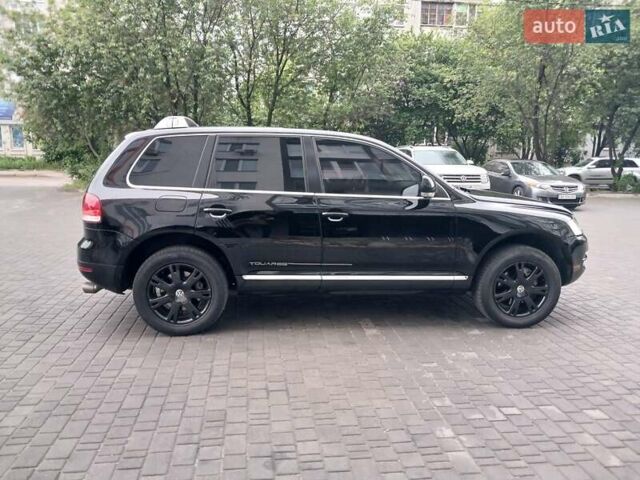 Черный Фольксваген Туарег, объемом двигателя 3.2 л и пробегом 280 тыс. км за 7700 $, фото 1 на Automoto.ua