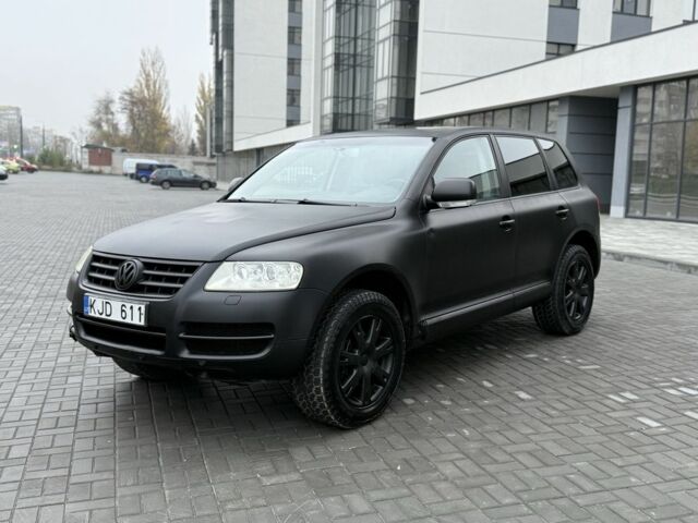 Черный Фольксваген Туарег, объемом двигателя 3 л и пробегом 360 тыс. км за 3999 $, фото 1 на Automoto.ua