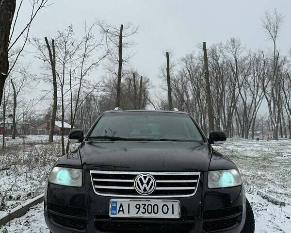 Чорний Фольксваген Туарег, об'ємом двигуна 2.97 л та пробігом 343 тис. км за 9000 $, фото 1 на Automoto.ua