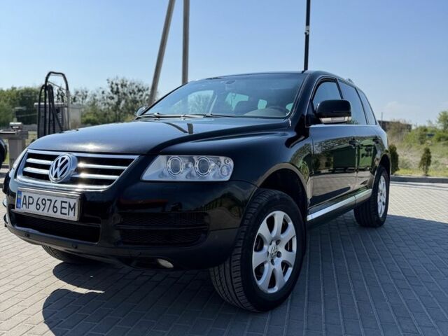 Черный Фольксваген Туарег, объемом двигателя 3 л и пробегом 270 тыс. км за 9990 $, фото 1 на Automoto.ua