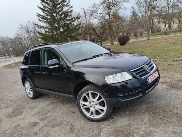 Черный Фольксваген Туарег, объемом двигателя 3 л и пробегом 300 тыс. км за 6500 $, фото 1 на Automoto.ua